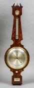 A 19th century mahogany cased banjo barometer
The broken swan-neck pediment above a dry/damp scale,