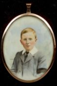 An unmarked yellow metal framed miniature portrait of a young boy
Monogrammed HW,