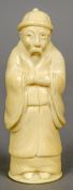 A 19th century Japanese carved ivory okimono of a sage
Formed as a bearded figure in a flowing robe.