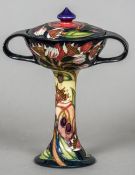 A modern Moorcroft pottery Collectors Club Symphony pot pourri and cover by Emma Bossons
Signed,