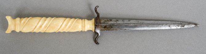 A late 18th/early 19th century stiletto dagger
Mounted with a spirally carved ivory handle.