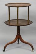 A 19th century mahogany two tier dumbwaiter
The dished upper tier supported by three brass tubular