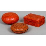 Three Chinese red cinnabar lacquer boxes and covers
One rectangular, the others circular,