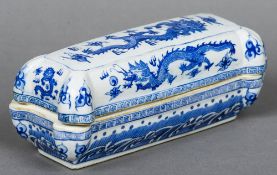 A Chinese porcelain blue and white box and cover
Of lobed rectangular form,