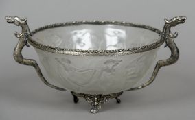 A white metal mounted Lalique style moulded glass centre bowl
Decorated with nudes in various poses,