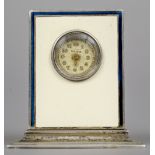 An enamel decorated silver miniature desk clock
With cream and blue enamel decorations,