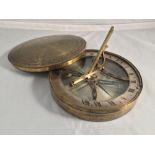A 19th century lacquered brass cased pocket sundial compass by Spear,
