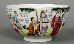 A finely painted lobed 19th century Chinese porcelain bowl
Decorated with warriors and calligraphy