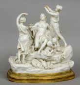 A Kalk porcelain table centre
Worked as a lively bacchic scene,