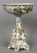 A 19th century Carl Thieme at Potschappel porcelain table centre
The floral encrusted basket