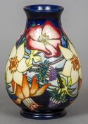 A Moorcroft pottery Golden Jubilee vase by Emma Bossons
Variously marked to base.  19 cm high.