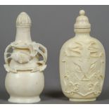 Two Chinese carved ivory snuff bottles
One decorated with fish, the other with a mythical beast.