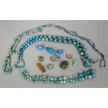 A collection of Egyptian faience beads, circa 100 BC to 100 AD
Strung as three necklaces,