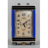 A miniature enamel decorated silver carriage clock
With blue and black enamel decorations.  4.