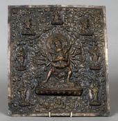 A 19th century Eastern bronzed metal repousse plaque,