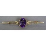 An 18 ct gold amethyst and rose diamond bar brooch
9 cm wide.