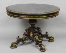 A 19th century ormolu mounted ebonised centre table
Of circular form,