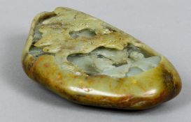 A Chinese carved jade boulder
Worked with figures in a mountainous landscape.  21.5 cm long.