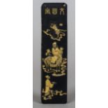 A small Chinese ink block
The front decorated in gilt with a courtly figure on a horse with