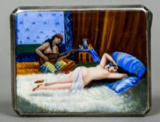 An Alpacca enamel decorated cigarette case
The front depicting a nude lady reclining on a bed with