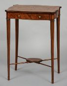 A George III inlaid satinwood side table
The shaped rectangular top centred with an oval panel of