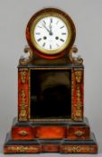 A 19th century French ormolu mounted faux tortoiseshell and ebonised drum head mantle clock by