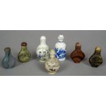 A collection of seven various Chinese porcelain and hardstone snuff bottles
The largest 8.5 cm high.