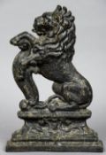 A 19th century cast iron door stop
Worked as a rampant lion.  38.5 cm high.