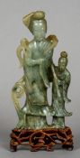 A Chinese carved jadeite group
Worked as Quanyin with attendant,