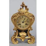 A 19th century ormolu cased mantel clock
The silvered dial with Roman numerals and bell striking