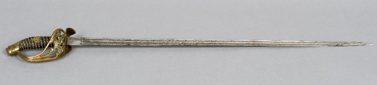 A 19th century Prussian officers sword
The wire bound shagreen hilt and guard with Kaiser Wilhelm