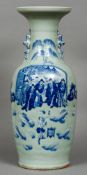 A Chinese porcelain vase
Figurally decorated.  61 cm high.