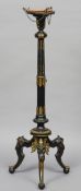 A 19th century ormolu and patinated bronze mounted torchere stand
The marble inset top above the