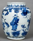 A 17th century Chinese transitional period blue and white porcelain vase
Decorated with figures in