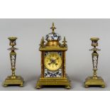 A French gilt metal and champleve triple clock garniture
The gilt dial with Arabic numerals signed