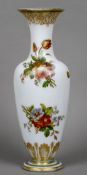 A 19th century painted opaline glass vase
Decorated in the round with floral bouquets.  49.