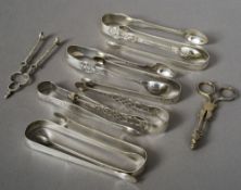 Ten pairs of Georgian and Victorian silver sugar tongs, various dates and makers
Various sizes.