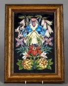 A modern Moorcroft pottery limited edition floral plaque
Signed, numbered 29/750,