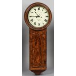 A 19th century mahogany and rosewood banded Norwich type eight day chiming drop dial wall clock
The