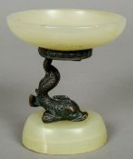 A small bronze mounted carved onyx tazza
The upright worked as a sea creature.  10.5 cm high.