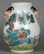 A Chinese porcelain twin handled baluster vase
The handles formed as deer masks,