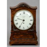 A William IV mahogany cased bracket clock by Francis Sinderby
The signed white painted dial with