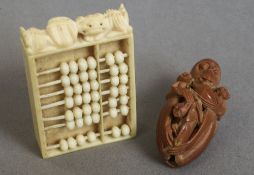 A Chinese Canton carved ivory miniature abacus 
The beads opposing figures in a landscape;