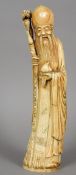 A Chinese carved ivory tusk figure of Shao Loa
Typically modelled in flowing robes holding a fruit