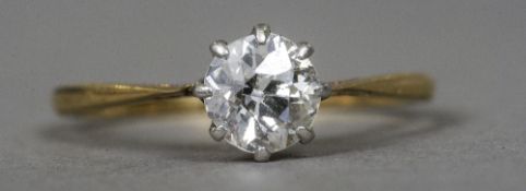 An 18 ct gold diamond solitaire ring CONDITION REPORTS: Small inclusions,