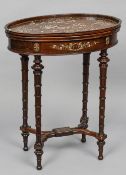 A late 19th century Chinese mother-of-pearl inlaid rosewood table
The galleried oval top profusely