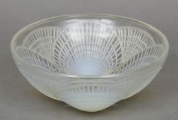 A Rene Lalique glass bowl
Coquilles pattern, wheel engraved signature R.