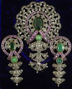 A suite of unmarked silver and gold set emerald,