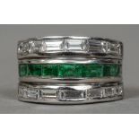 A contemporary 18 ct white gold diamond and emerald ring
Set with twelve baguette cut diamonds and