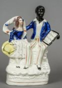 A rare Victorian Staffordshire pottery group,